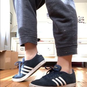 Navy blue three stripe adidas sneakers
